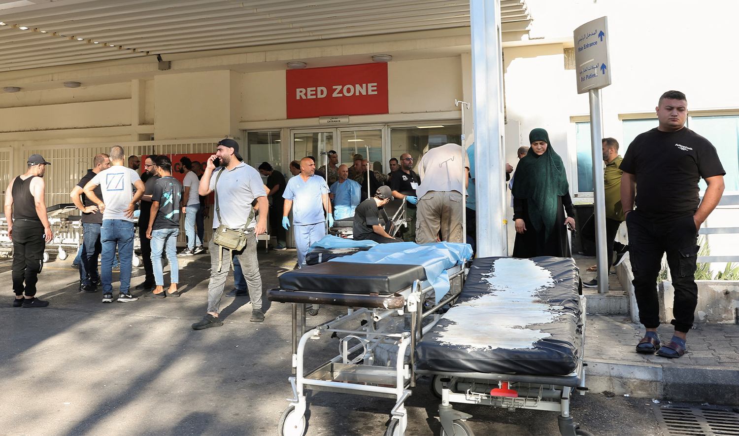 People gather outside a hospital, as hundreds of members of the Lebanese armed group Hezbollah, including fighters and medics, were seriously wounded on Tuesday when the pagers they use to communicate exploded, according to a security source, in Beirut, Lebanon, on September 17, 2024. (REUTERS)