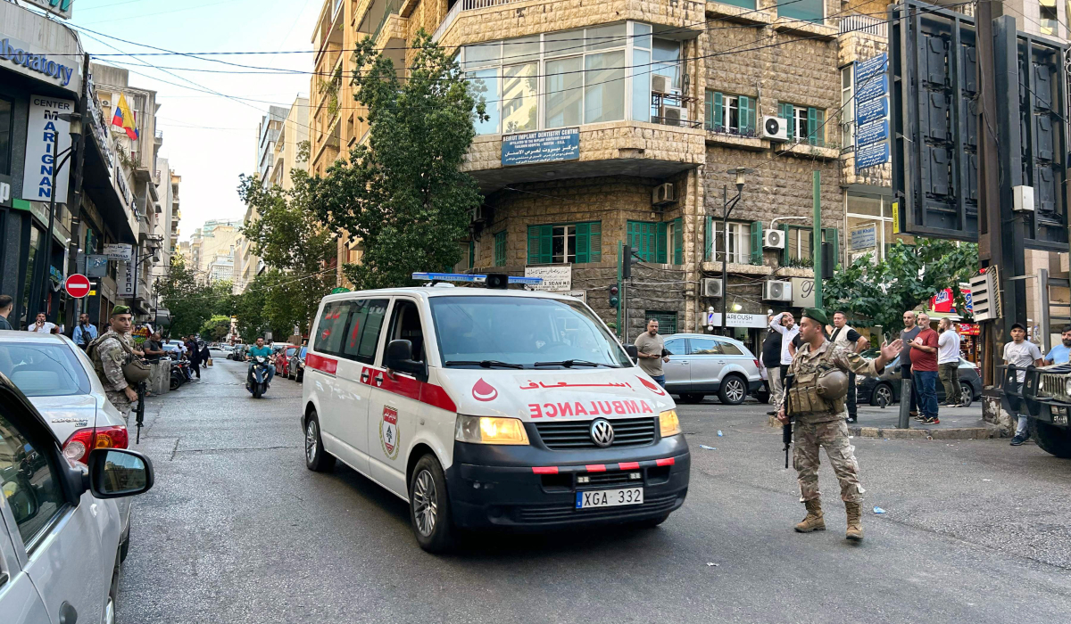 An ambulance rushes wounded people to a hospital in Beirut on September 17, 2024, after explosions hit locations in several Hezbollah strongholds around Lebanon amid ongoing cross-border tensions between Israel and Hezbollah fighters. (AFP)