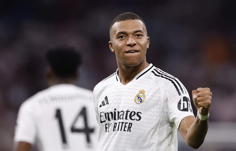 Real Madrid's Kylian Mbappe celebrates scoring their first goal. (Reuters)