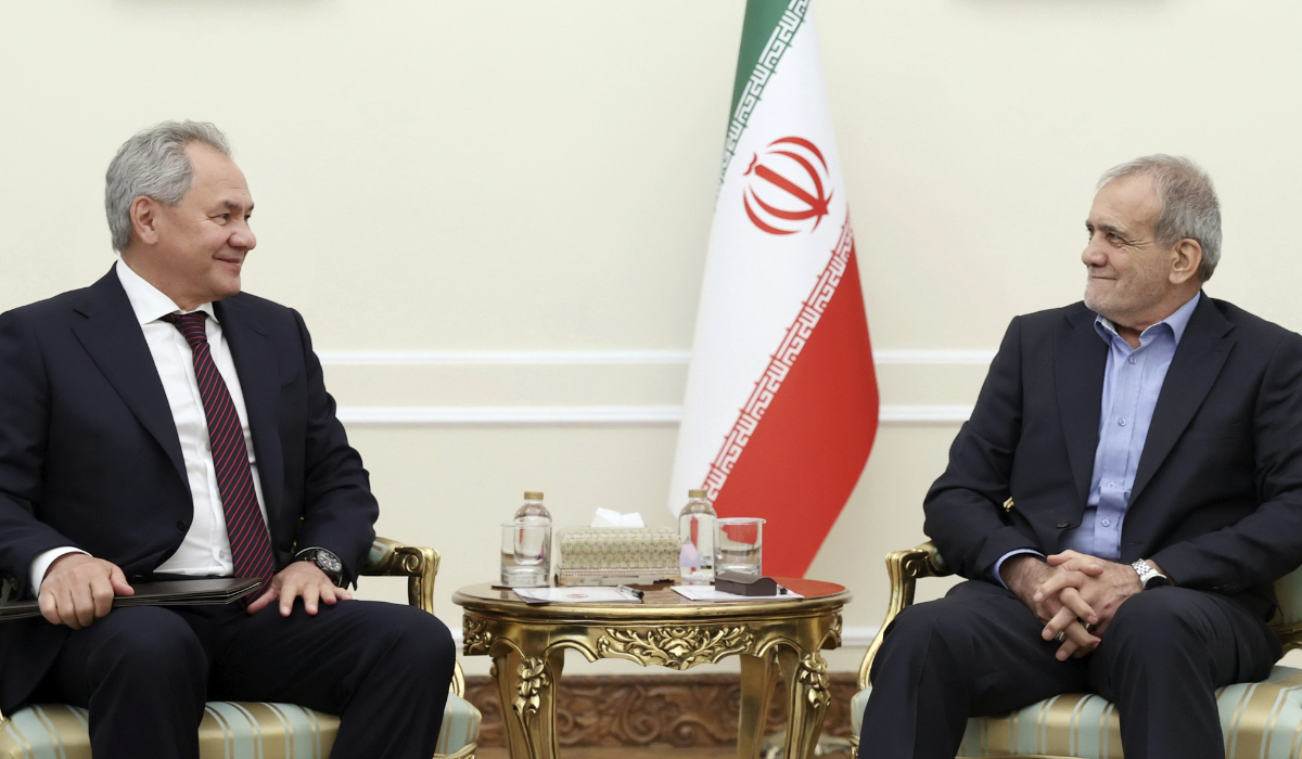 In this imaged released by the Iranian Presidency Office, President Masoud Pezeshkian, right, meets secretary of Russia's Security Council Sergei Shoigu at his office in Tehran, Iran, Tuesday, Sept. 17, 2024. (AP)