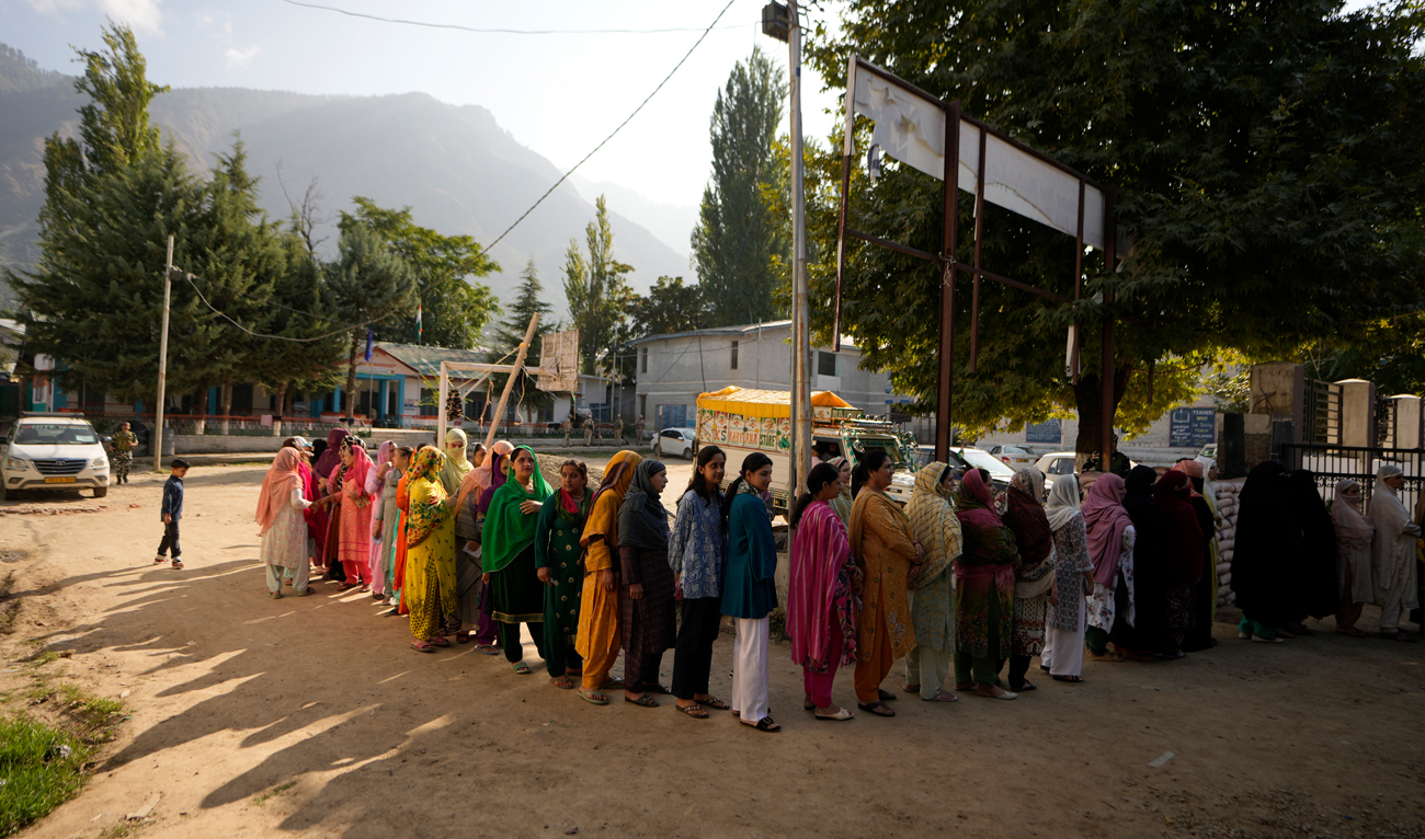 People queue up to cast their vote at a polling booth during the first phase of the Jammu and Kashmir Assembly election, in Kishtwar, India on September 18, 2024. (AP)