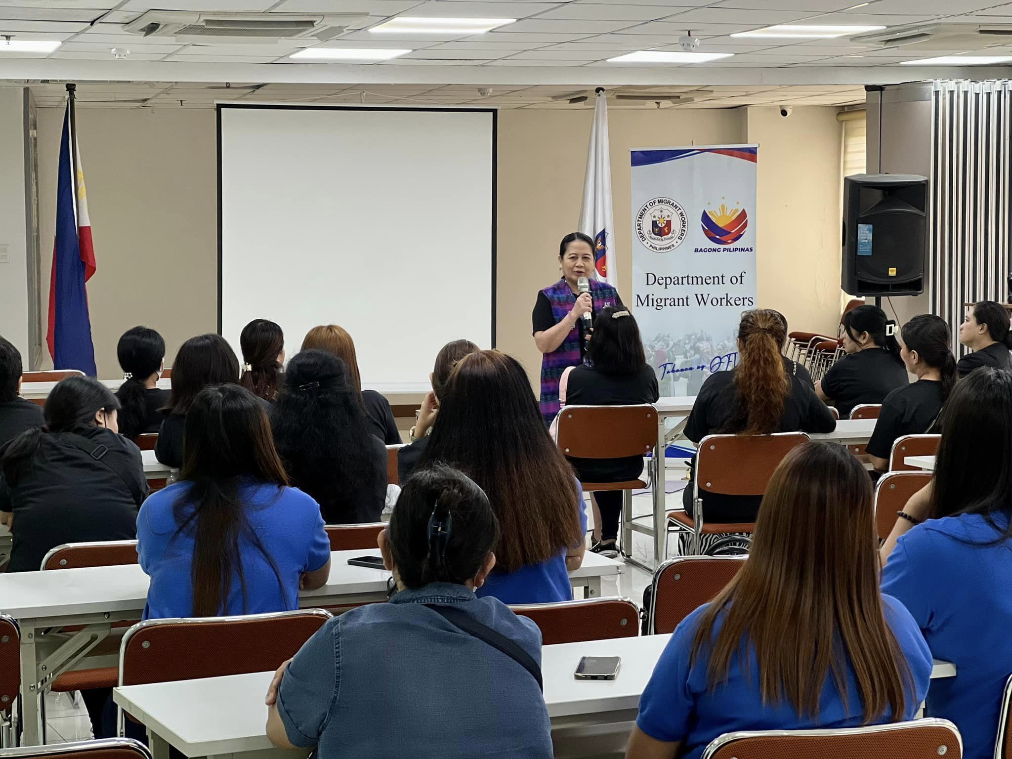 The Philippines' Department of Migrant Workers conducted a pre-departure briefing for Filipino migrant workers bound for Kuwait in this photo shared on Sept. 16, 2024. (Department of Migrant Workers)