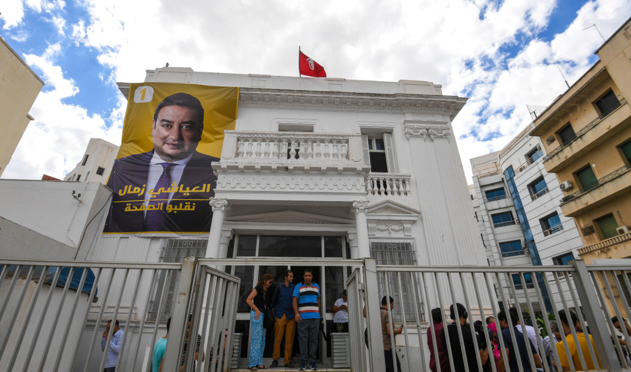 A poster of imprisoned presidential candidate Ayachi Zammel is displayed at the entrance of his electoral headquarters on September 16, 2024, in Tunis, ahead of presidential election. (AFP/File)