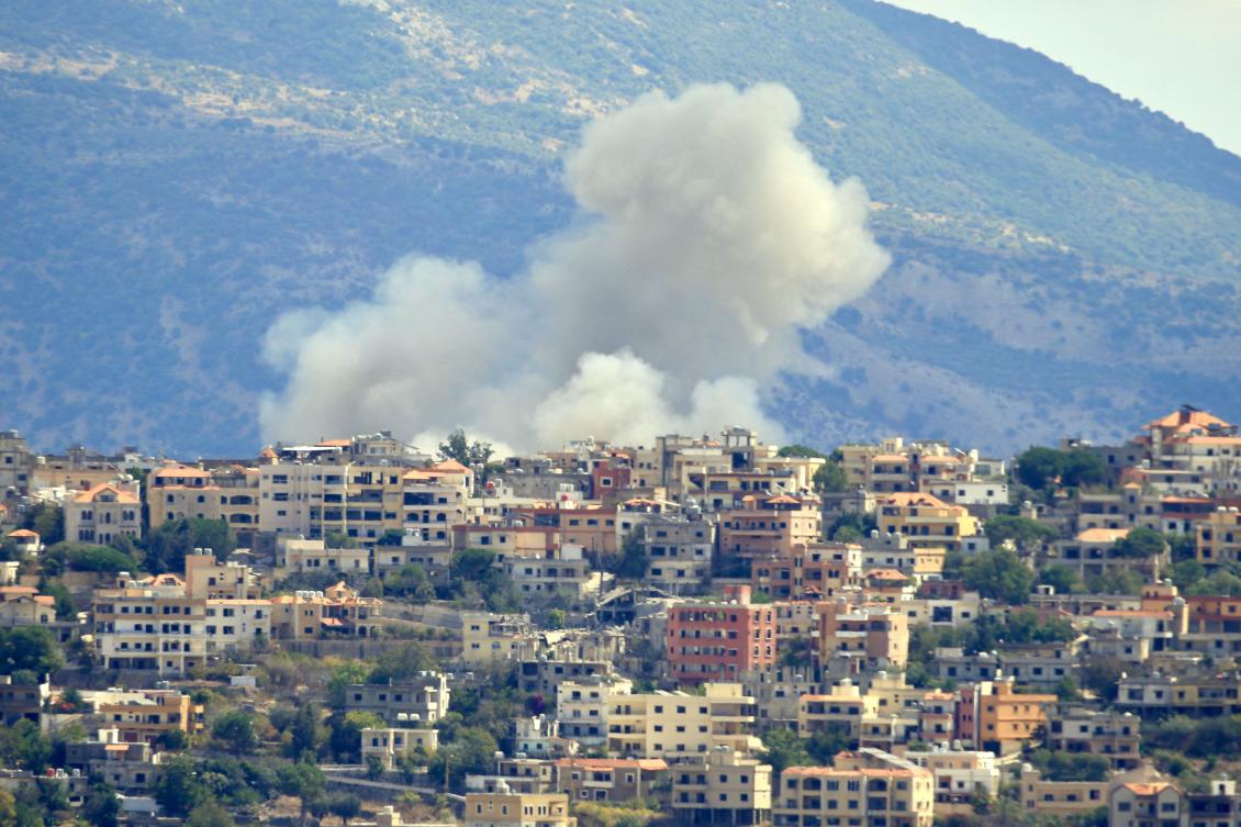 Smoke billows from the site of an Israeli airstrike in the southern Lebanese village of Khiam near the border on Sept. 19, 2024. (AFP)