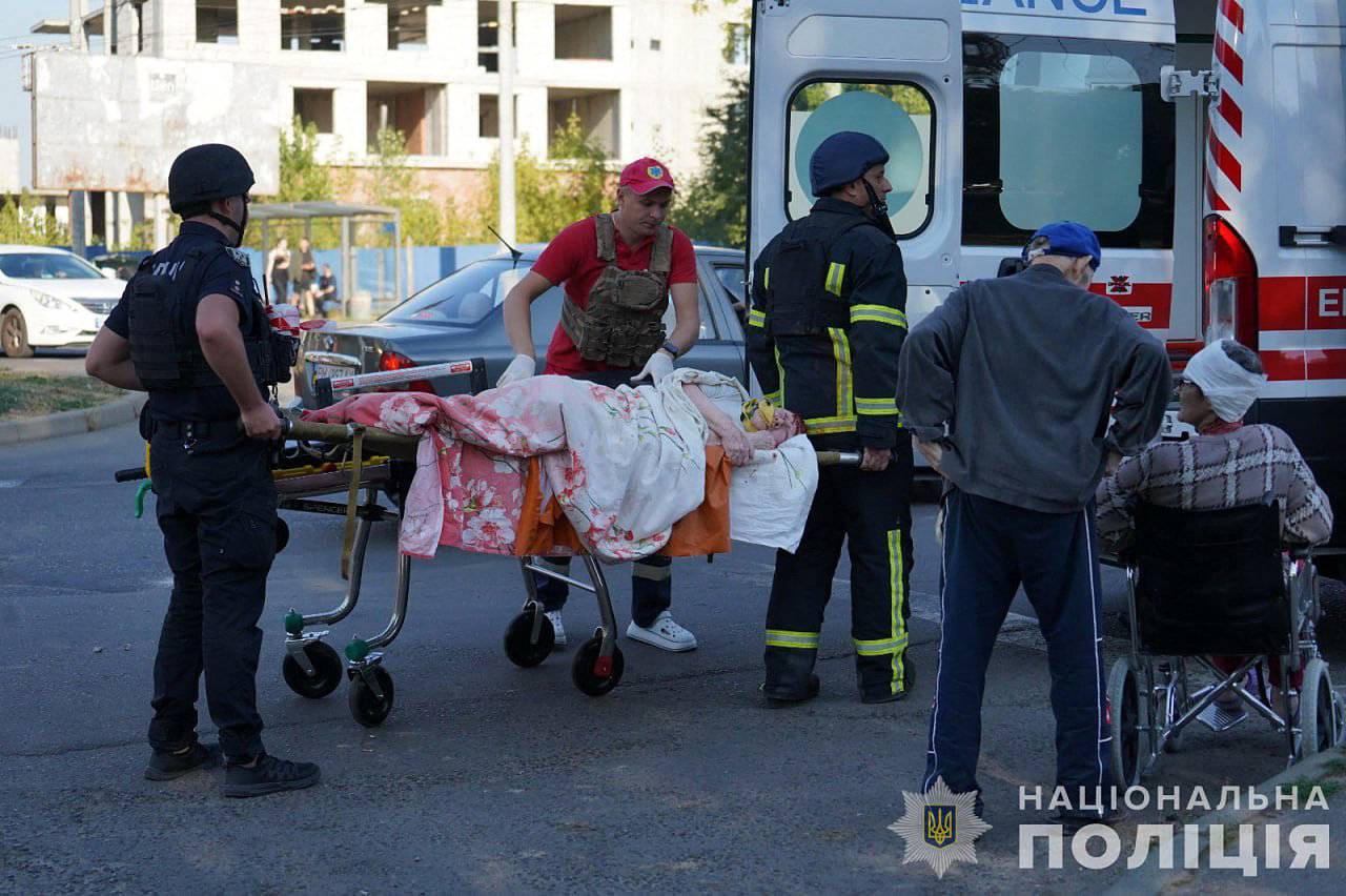 Rescuers transport victims of an airstrike on a geriatric center to an ambulance in the city of Sumy, amid the Russian invasion in Ukraine. (Ukraine handout photo/AFP)