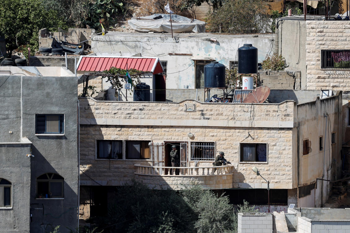 Israel investigates after videos show soldiers pushing bodies off West Bank roof