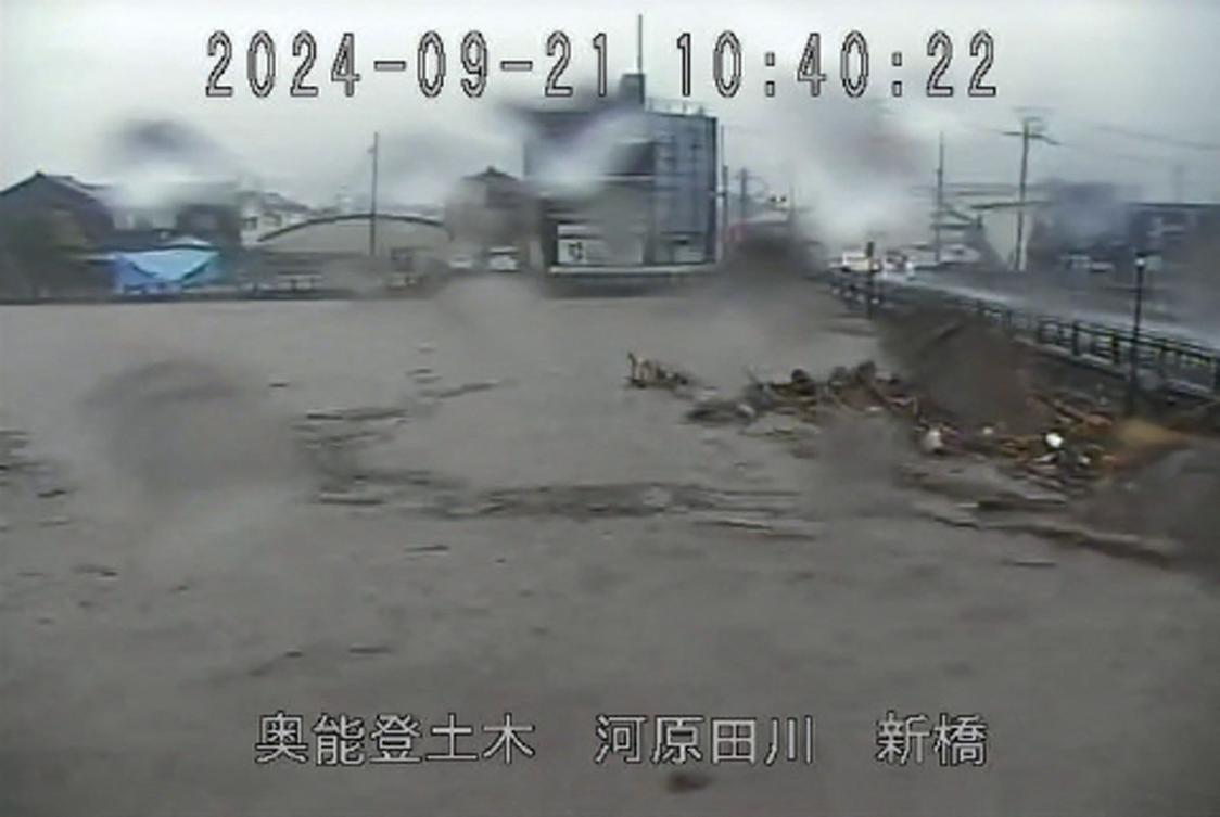 Japanese authorities told tens of thousands of people to evacuate the quake-hit region of Ishikawa on September 21 as heavy rain caused flooding, with one person unaccounted for, officials said. (AFP)
