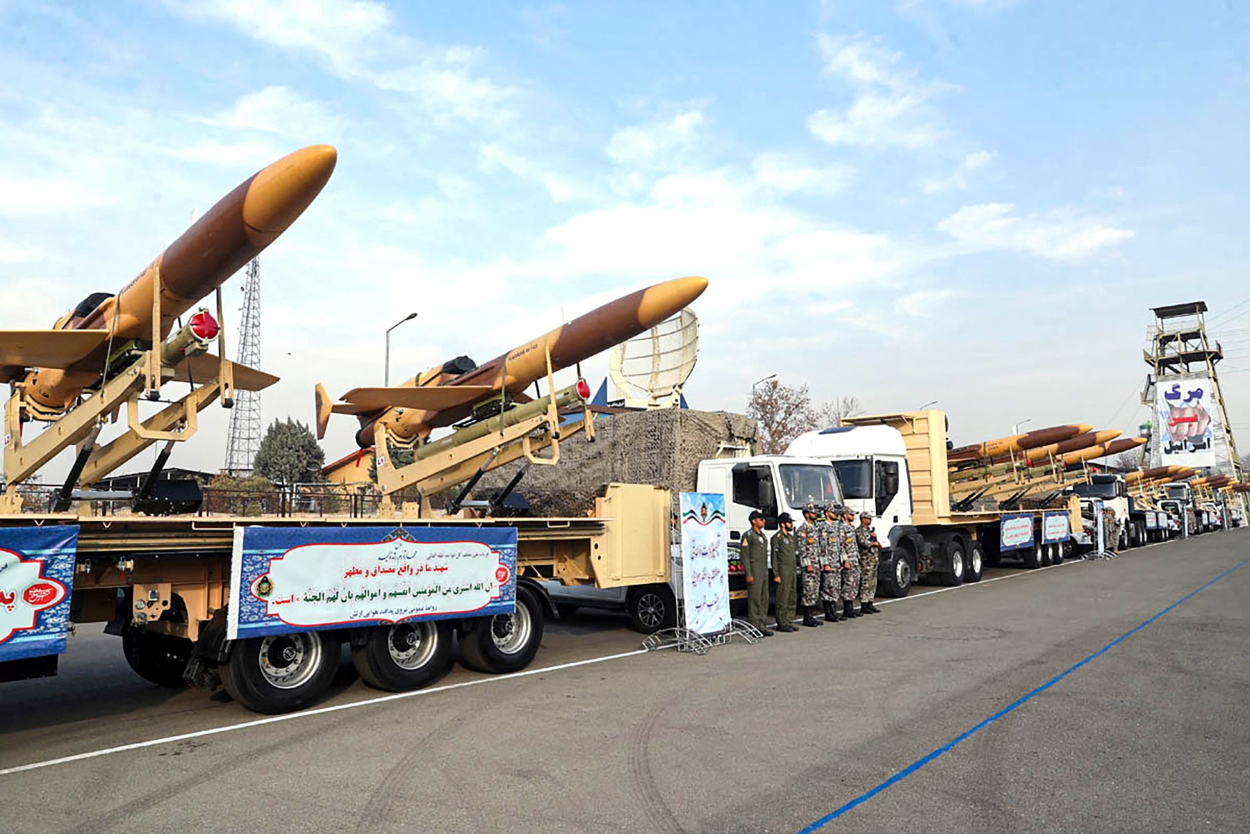 A handout picture provided by the Iranian Army office on December 10, 2023, shows Iranian homemade Karrar drones in Tehran. (AFP)