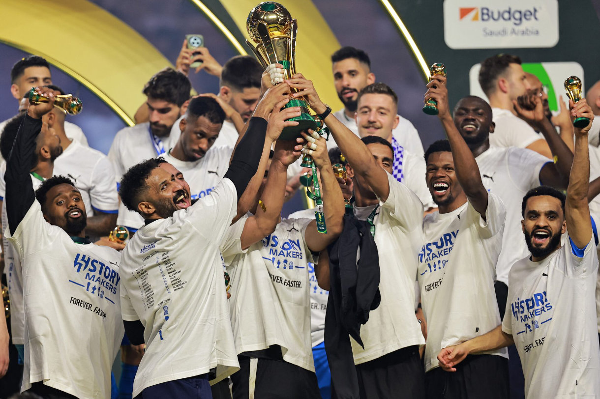 Al-Hilal players celebrate with the trophy after winning the Saudi Kings Cup final. (Reuters/File)