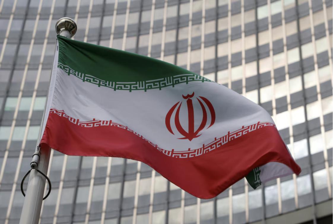 The Iranian flag flutters in front of the International Atomic Energy Agency (IAEA) organisation's headquarters in Vienna, Austria, June 5, 2023. (File/Reuters)
