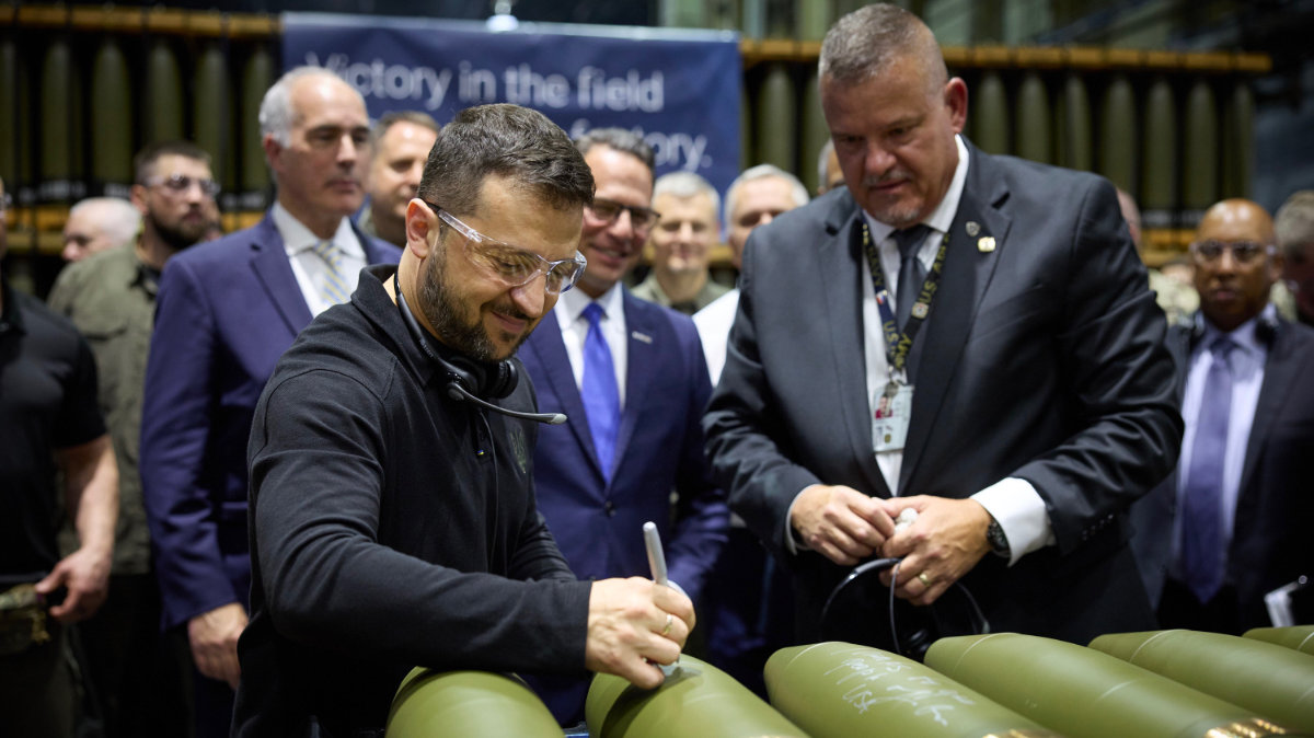 In this photo posted on the X platform, Ukrainian President Volodymyr Zelensky is given a tour of the factory that manufactures 155 mm artillery shells that Ukrainian forces are using to fight Russian invaders. (X: @ZelenskyyUa)