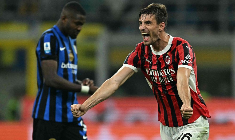 AC Milan's Italian defender Matteo Gabbia celebrates after winning 2-1 the Italian Serie A football match between Inter and AC Milan at San Siro stadium in Milan on Sunday. (AFP)