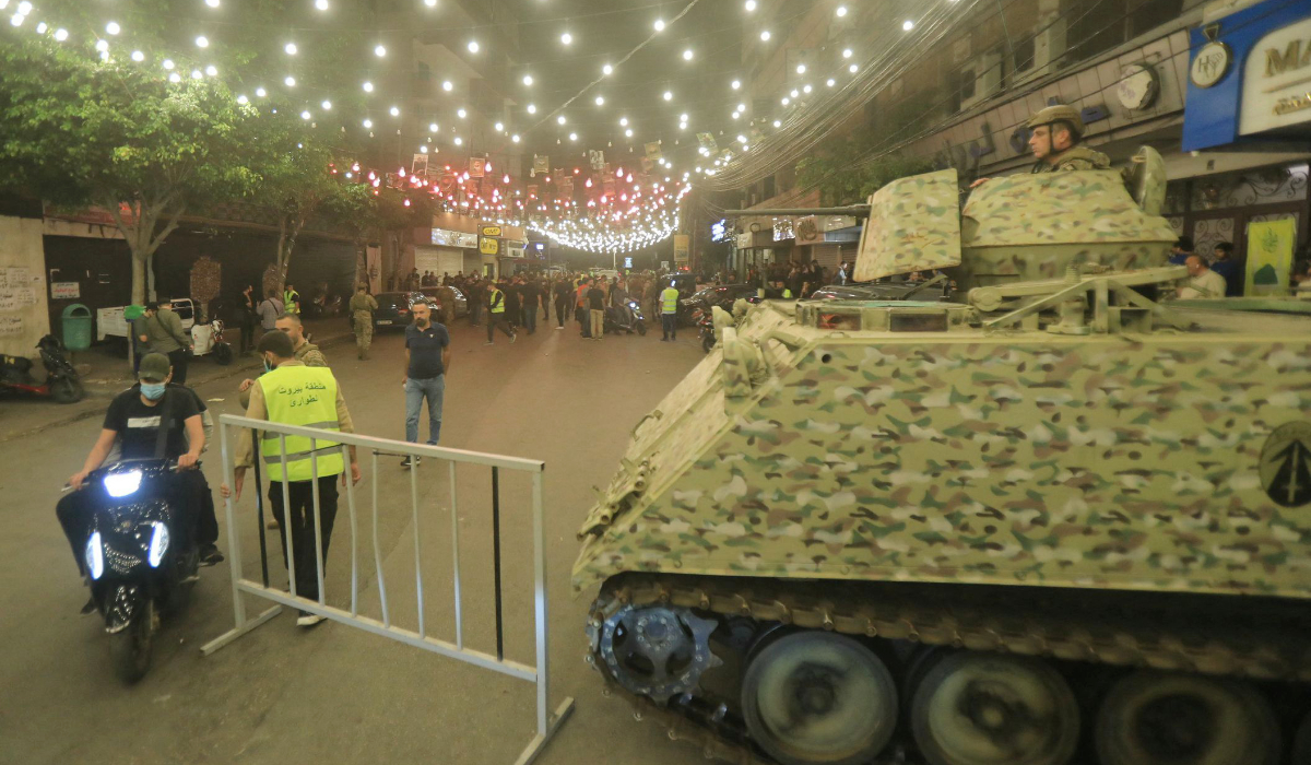 Emergency responders gather at the site of an Israeli strike on Beirut's southern suburbs on September 23, 2024. (AFP)