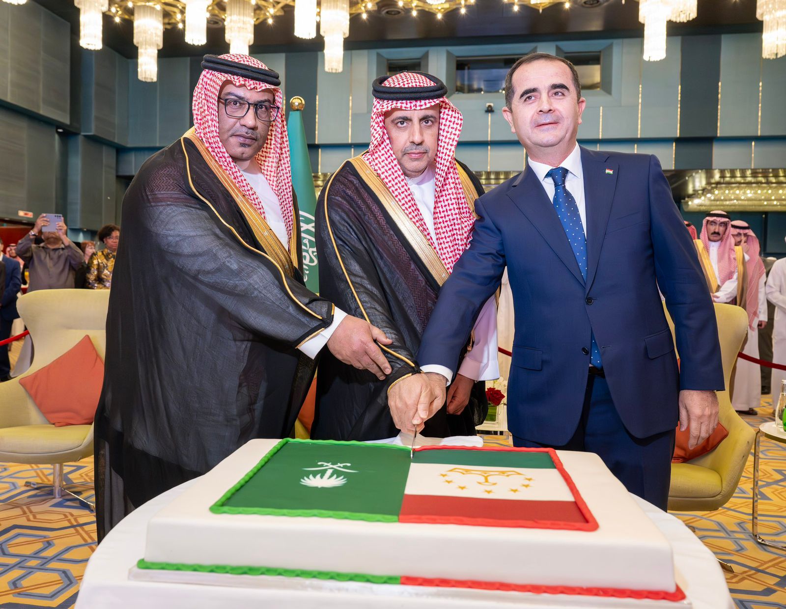 Tajikistan Ambassador Akram Karimi cutting cake with Undersecretary of Riyadh Region Faisal bin Abdulaziz Al-Sudairy. (Supplied)