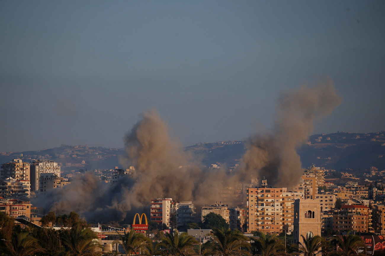 Smoke billows over southern Lebanon following an Israeli strike, as seen from Tyre, Lebanon September 25, 2024. (Reuters)