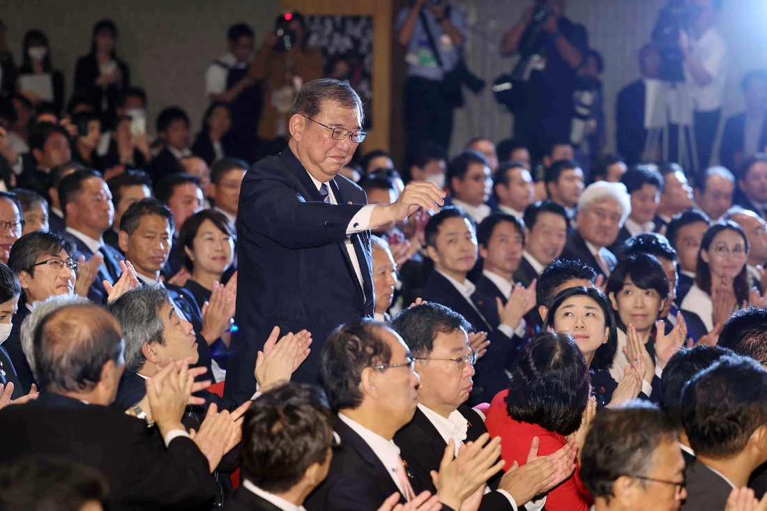 Considered a defense policy expert, Ishiba has proposed an Asian version of the Nato military alliance and a more equal Japan-US security alliance. (AFP)