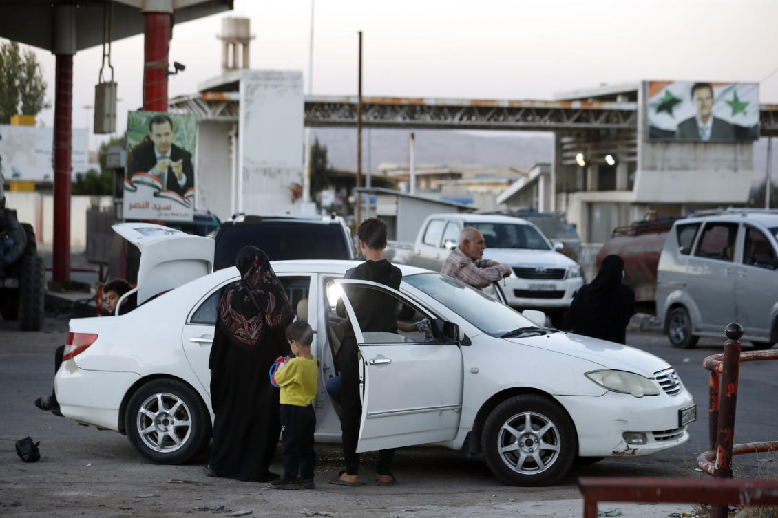 Lebanese fleeing the Israeli bombardment, arrive in a taxi at the Syrian-Lebanese border crossing in Jdaidet Yabous, Syria. (AP)