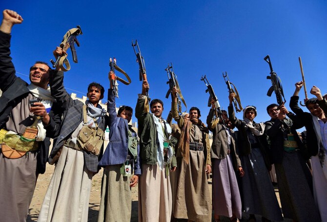 Armed Yemeni men gather in Sanaa to show their support for the Houthis. (AFP/File Photo)