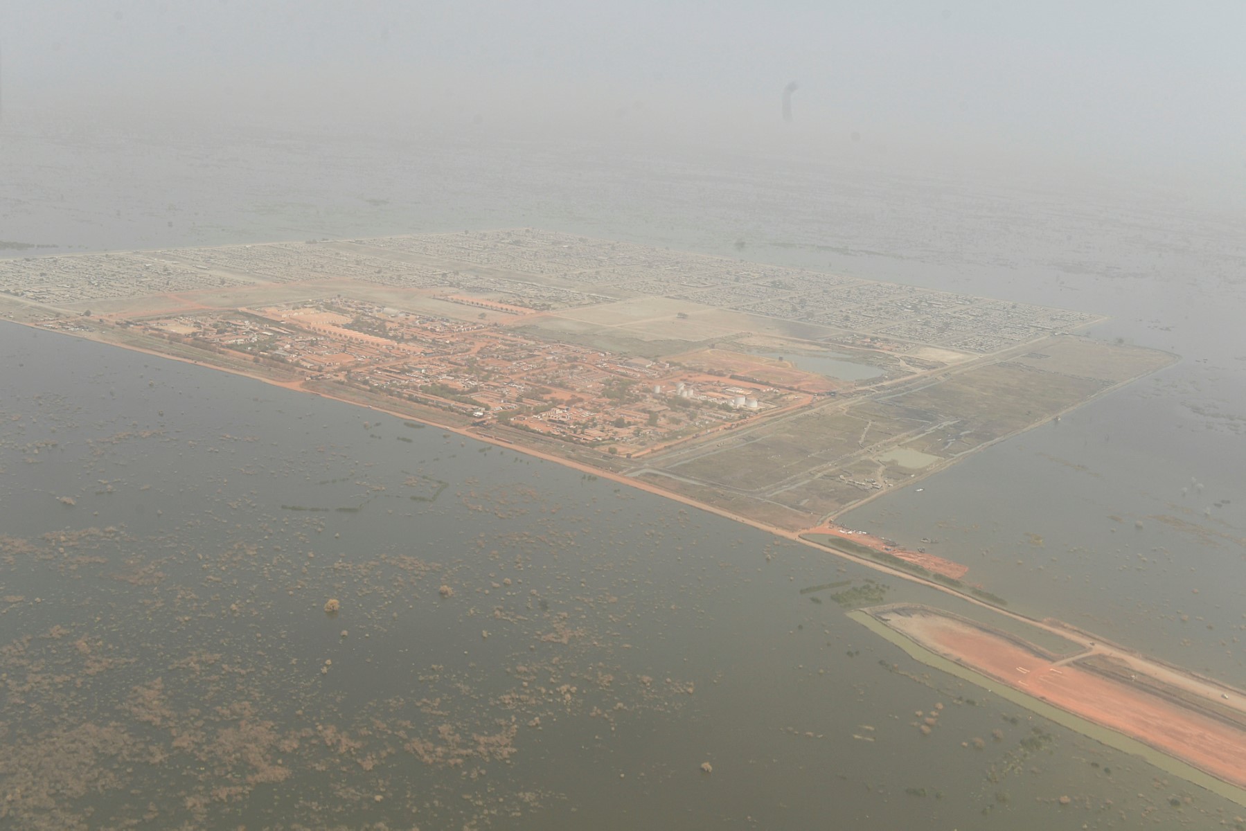 This aerial view shows Bentiu surrounded by flooded water on February 10, 2023. Four straight years of flooding, an unprecedented phenomenon linked to climate change, has swamped two-thirds of South Sudan but nowhere more dramatically than Bentiu (AFP)