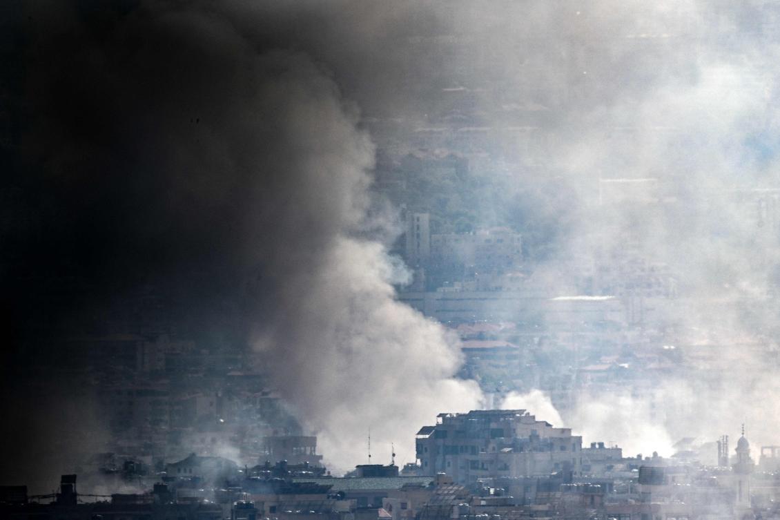 Smoke rises over Beirut's southern suburbs during Israeli strikes on September 28, 2024. Lebanon's Iran-backed Hezbollah group confirmed on September 28 that its leader Hassan Nasrallah had been killed, after Israel said it had "eliminated" him in a strike on south Beirut a day earlier. (Photo by JOSEPH EID / AFP)