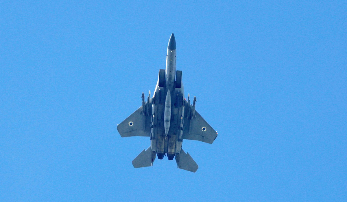 An Israeli Air Force fighter jet flying over the border area with south Lebanon on April 8, 2024. (AFP)
