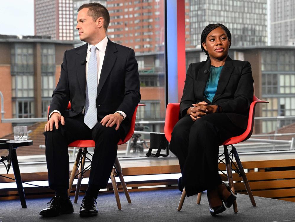 Robert Jenrick (L) and Kemi Badenoch (R) appearing on the BBC's 'Sunday Morning' political television show with journalist Laura Kuenssberg in Birmingham, central England during the party's annual conference. (AFP)
