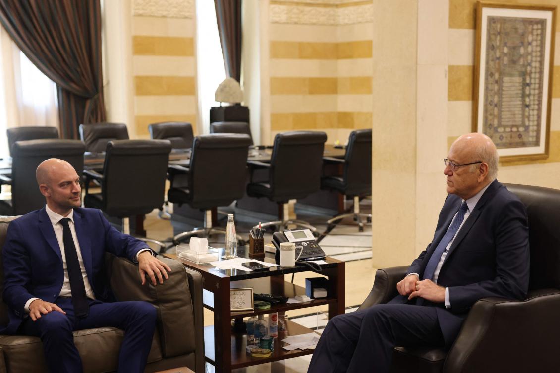 Lebanon's caretaker Prime Minister Najib Mikati meets with French Minister of Foreign Affairs Jean-Noel Barrot in Beirut on September 30, 2024. (AFP)