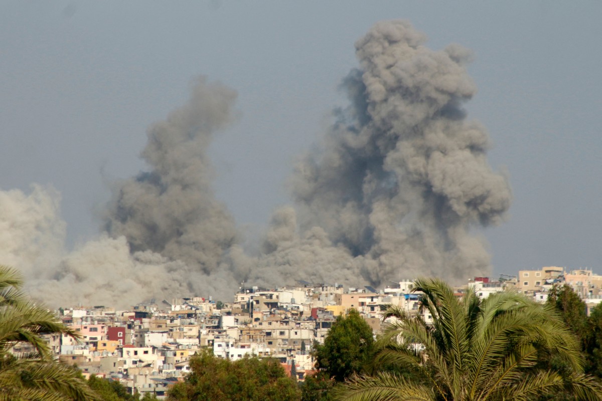 Smoke billows after an Israeli strike on a village near the southern Lebanese city of Tyre on September 29, 2024.(AFP)