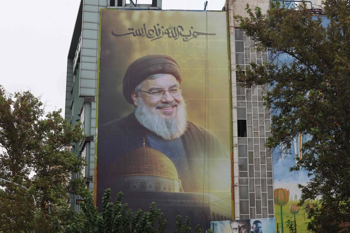 A billboard bearing a picture of Lebanon’s Hezbollah leader Hassan Nasrallah, who was killed in an Israeli air strike on Beirut’s southern suburbs on September 27, is displayed in Tehran on September 30, 2024. (AFP)