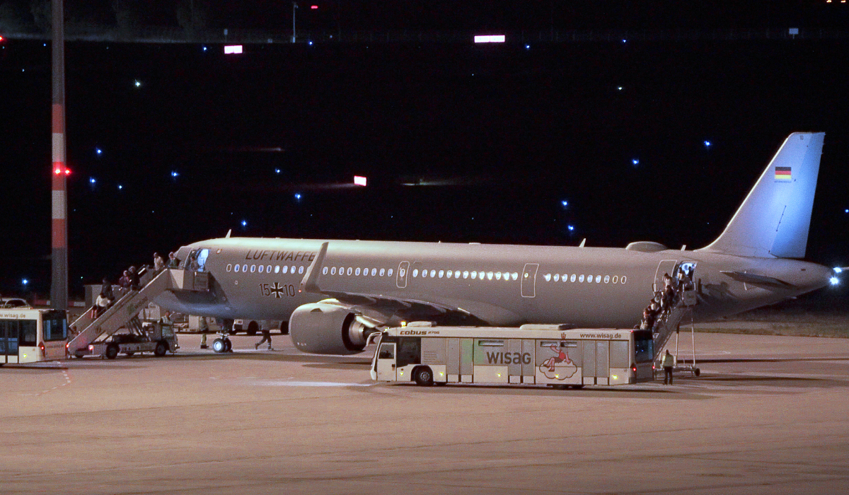 Passengers leave a Bundeswehr aircraft after landing in Berlin's airport, Germany, Monday, Sept. 30, 2024. (AP)