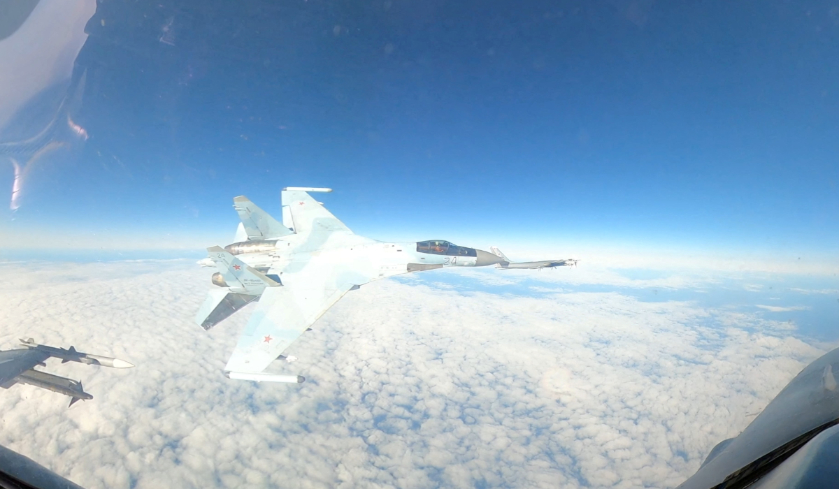 A Russian military aircraft Su-35 flies next to the North American Aerospace Defense Command (NORAD) aircraft, F-16, in the Alaska ADIZ (Air Defense Identification Zone) September 23, 2024, in this handout image. (REUTERS)