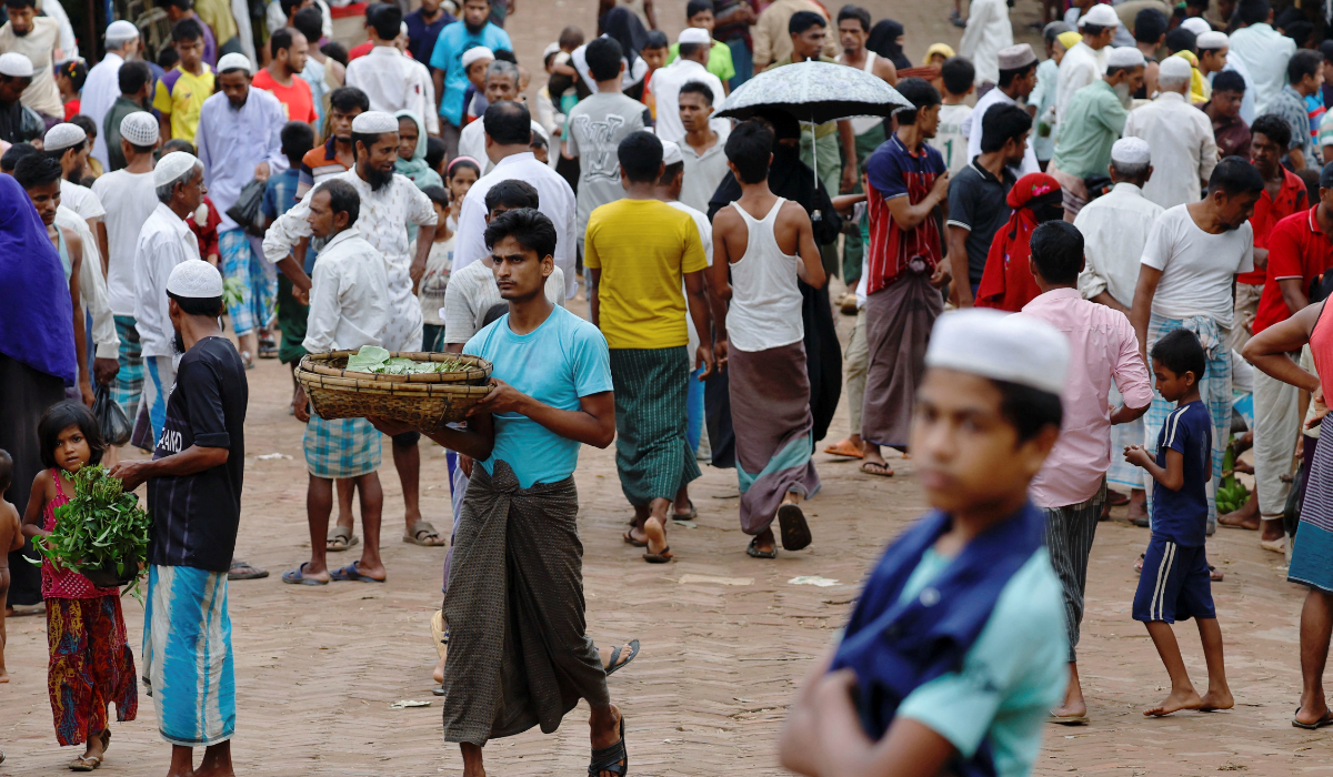 Rohingya refugees walk at a market in a refugee camp, in Cox's Bazar, Bangladesh, September 28, 2024. (REUTERS)