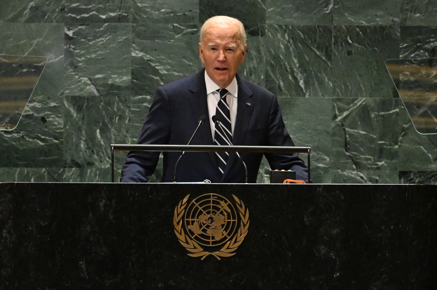 Biden asserted that the international system is working and that the US, in particular, is holding it together (File/AFP)