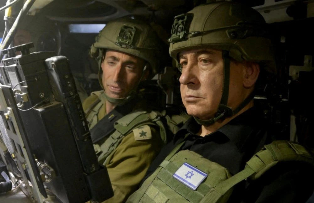 Benjamin Netanyahu visits Israeli soldiers in Rafah, in the southern Gaza Strip, July 18, 2024. (Reuters)
