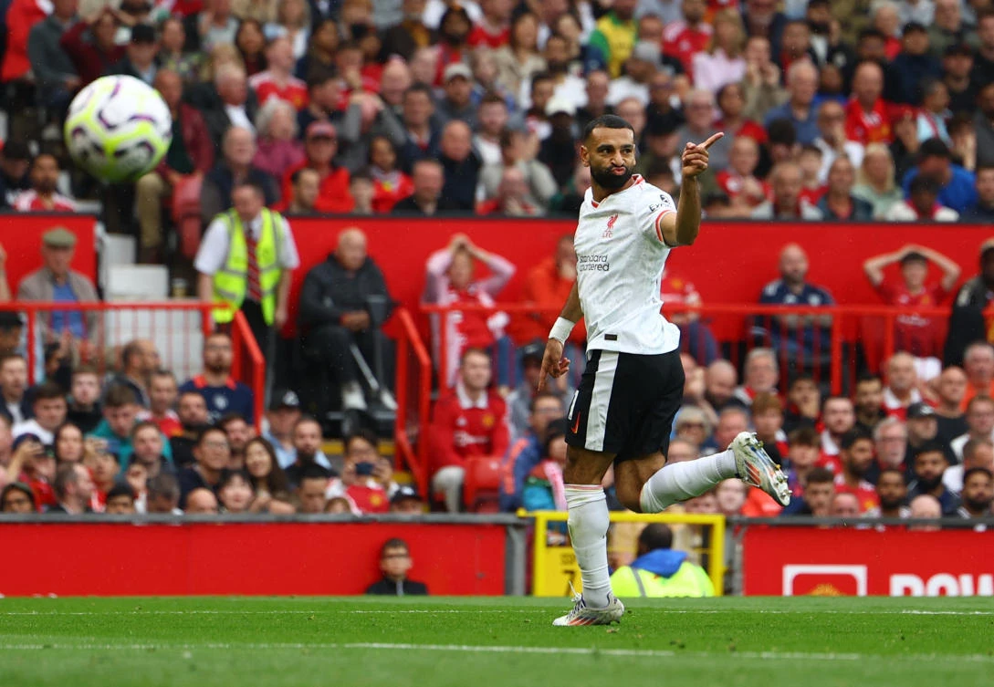 Liverpool’s Mohamed Salah celebrates scoring their third goal against Manchester United at Old Trafford in the Premier League. (Reuters)