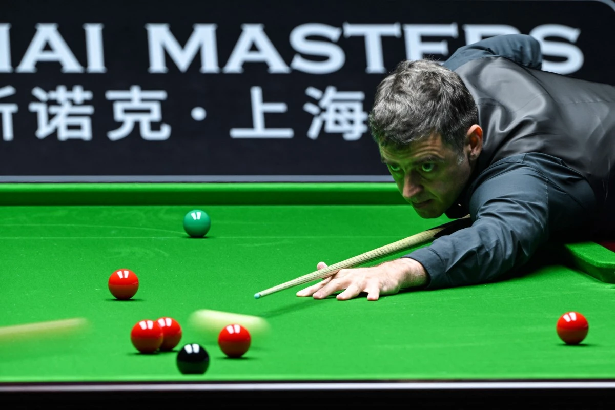 Ronnie O’Sullivan opens his Saudi Arabia Masters account against Ben Woollaston on Tuesday and spoke to SportsBoom.com ahead of the match about the trio’s longevity in the game. (AFP/File Photo)