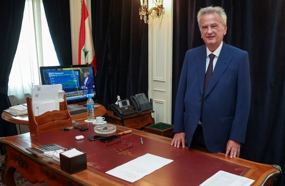 Longtime chief of Lebanon’s Central Bank Riad Salameh poses as he leaves office after a 30-year tenure, at Lebanon’s Central Bank building in Beirut, Lebanon, July 31, 2023. (Reuters)