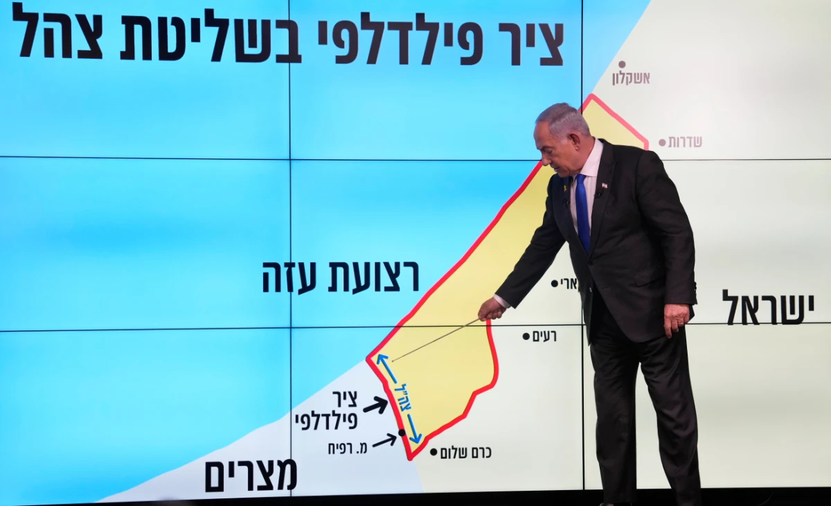 Israeli Prime Minister Benjamin Netanyahu stands before a map of the Gaza Strip, telling viewers that Israel must retain control over the "Philadelphi corridor," a strategic area along the territory's border with Egypt, during a news conference in Jerusalem, Monday, Sept. 2, 2024. (AP)