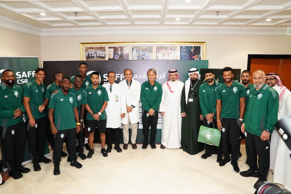 Saudi national team players and coach Roberto Mancini during their visit to King Faisal Specialist Hospital & Research Centre. (Supplied)