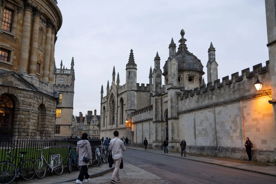 Restrictions on visas for international students is causing financial hardship for UK universities, they said on Thursday, calling for a hike in domestic tuition fees to offset yawning deficits. (AFP/File Photo)