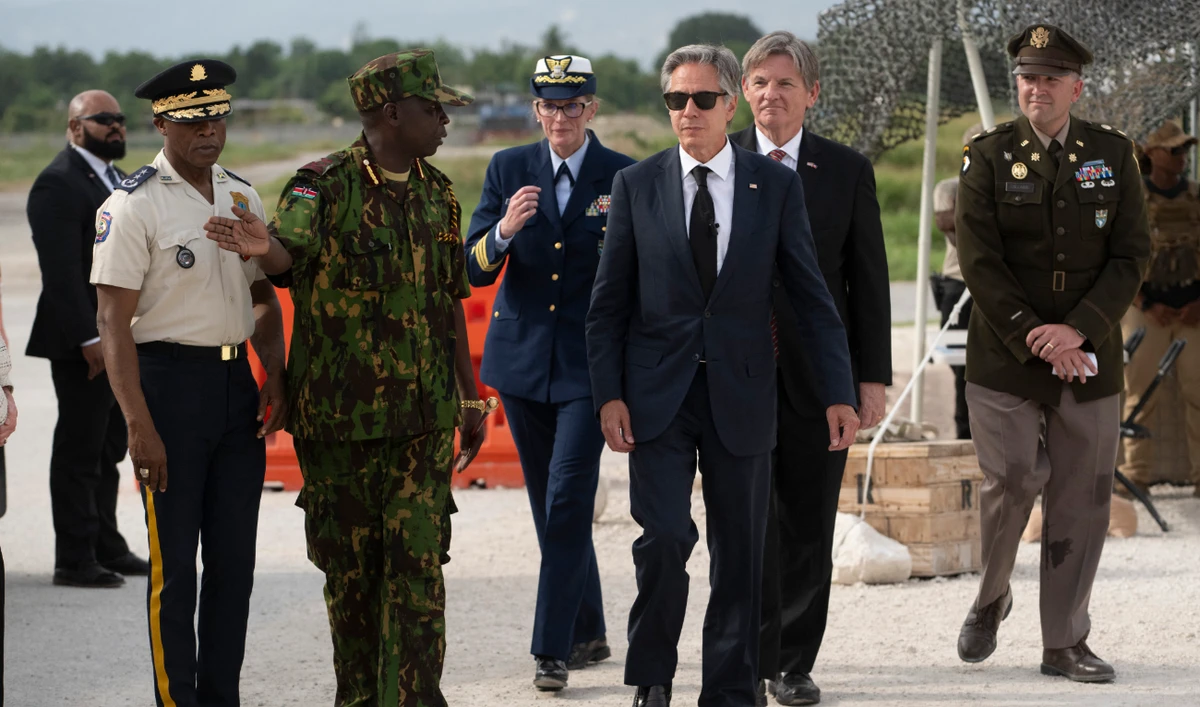 US Secretary of State Antony Blinken walks with the Commander of the Multinational Security Support Mission Commander Godfrey Otunge and the Haitian National Police General Director Rameau Normal (L) at the MSS base in Port Au Prince, Haiti on September 05, 2024. (AFP)