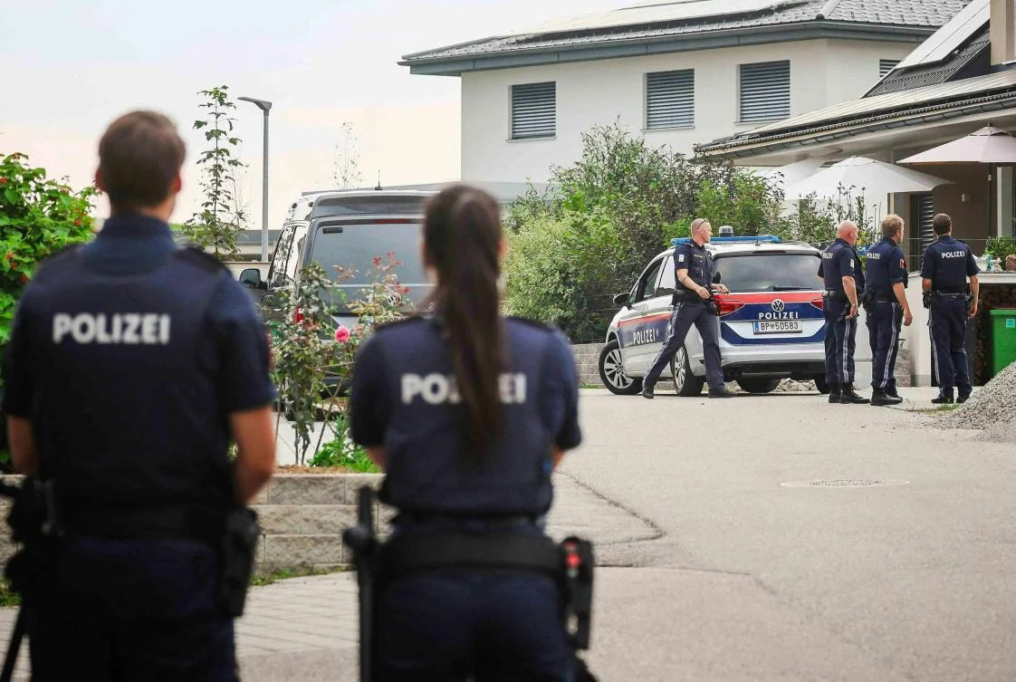 A picture shows a police operation on September 5, 2024 in Neumarkt am Wallersee in the Flachgau municipality near Salzburg, Austria, at the residence of the 18-year-old Austrian suspect who opened fire near the Israeli consulate in Munich. (AFP)