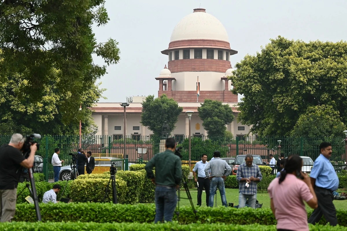 Journalists gather at the courtyard of the Supreme Court of India in New Delhi on Oct. 17, 2023. (AFP)