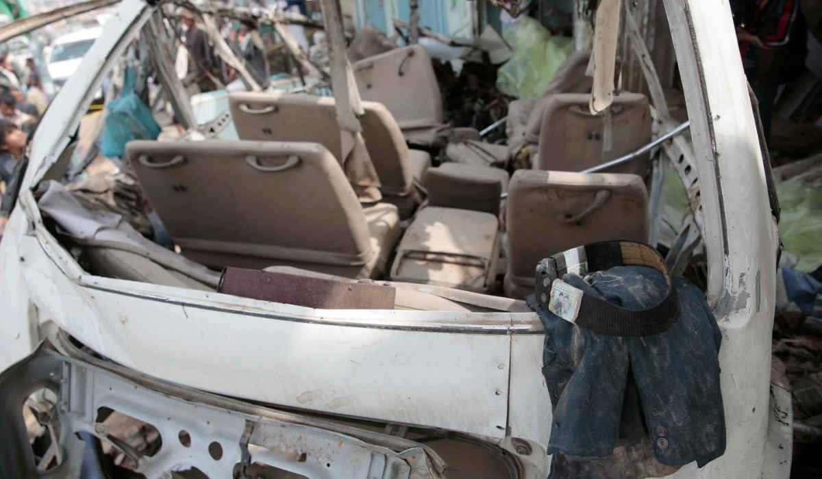 The clothes of a victam lies on the wreckage of a bus at the site of an airstrike in Saada, Yemen, Sunday, Aug. 12, 2018. (AP file photo)