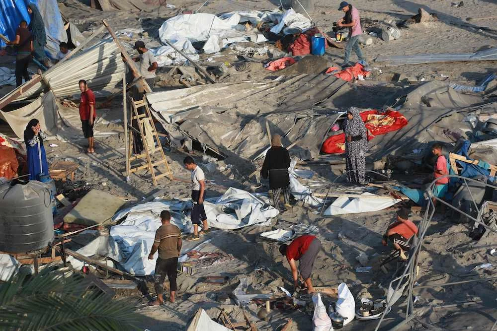 Israeli forces targeted unarmed civilians in a series of attacks on Tuesday, leaving 40 dead. (AFP)
