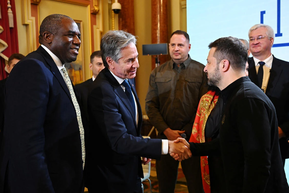 US Secretary of State Antony Blinken, shakes hands with President of Ukraine Volodymyr Zelensky as UK Foreign Secretary David Lammy looks on, during the Fourth Crimea Platform Leaders Summit on Sept. 11, 2024 in Kyiv. (Reuters)