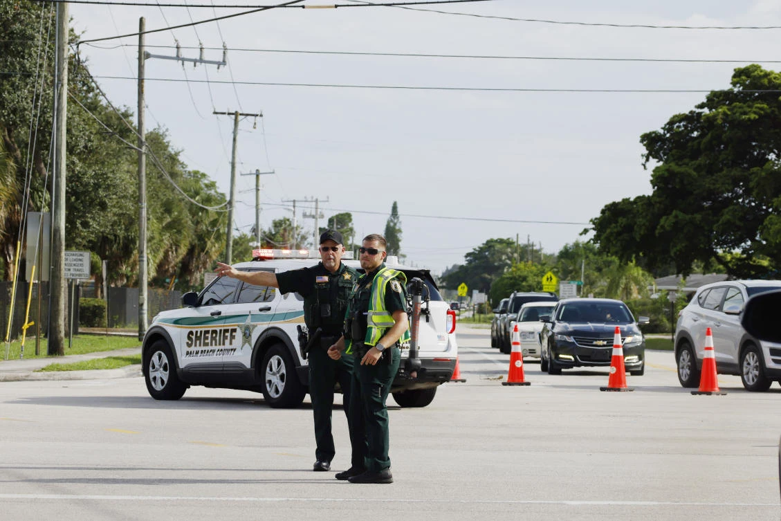Police officers direct traffic near Trump International Golf Club after the apparent assassination attempt of Republican presidential nominee former President Donald Trump in West Palm Beach on Sept. 15, 2024. (AP)