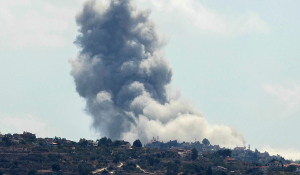 Smoke billows from the site of an Israeli airstrike that targeted the southern Lebanese village of Houla on September 16, 2024. (AFP)