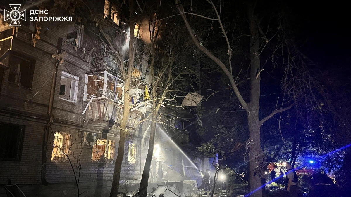 Firefighters and rescuers work at a site of an apartment building damaged by a Russian air strike, amid Russia's attack on Ukraine, in Zaporizhzhia, Ukraine, in this handout picture released on September 23, 2024. (Reuters)