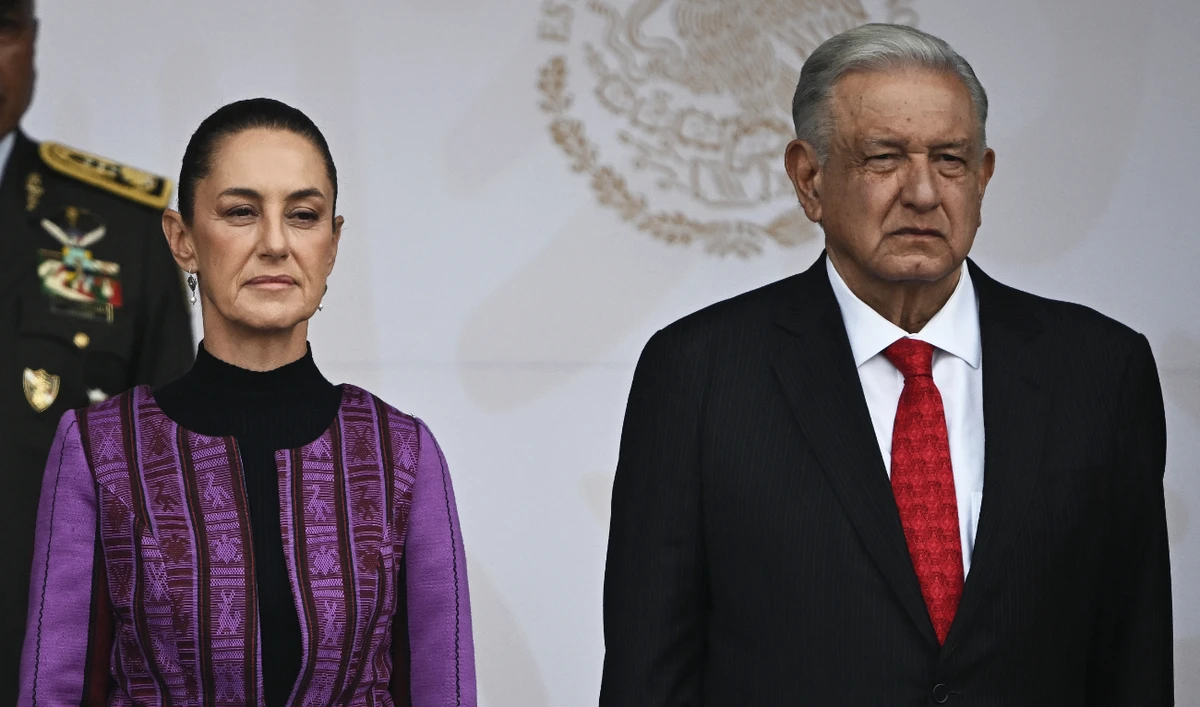 Mexican President Andres Manuel Lopez Obrador (R) and Mexican president-elect Claudia Sheinbaum attend the military parade for the 214th anniversary of Independence Day at the Zocalo Square in Mexico City on September 16, 2024. (AFP/File)
